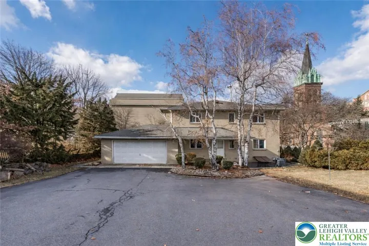 Large Driveway in front of House
