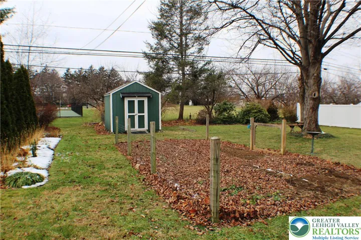 Garden is fenced & planted with perennial plants