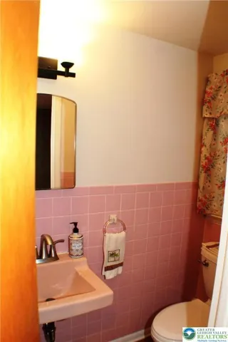 1/2 Bath is on the Family room level