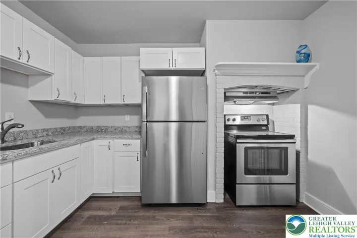 Kitchen with stainless steel appliances.