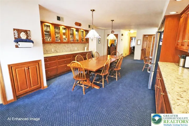 Eat-in kitchen with cherry cabinetry and granite countertops