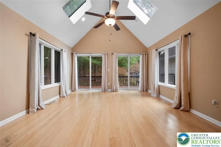 2 sliding doors lead to the large deck