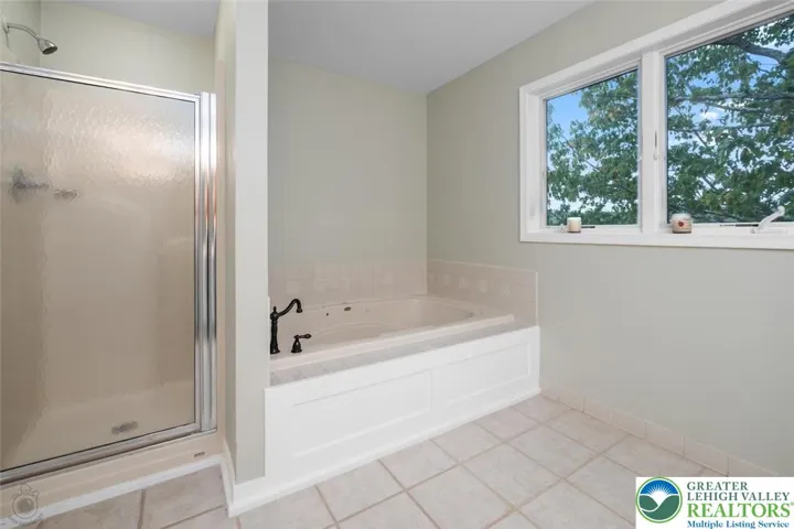 Jacuzzi tub and walk in shower