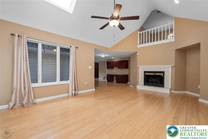 Family room with skylights and vaulted ceilings