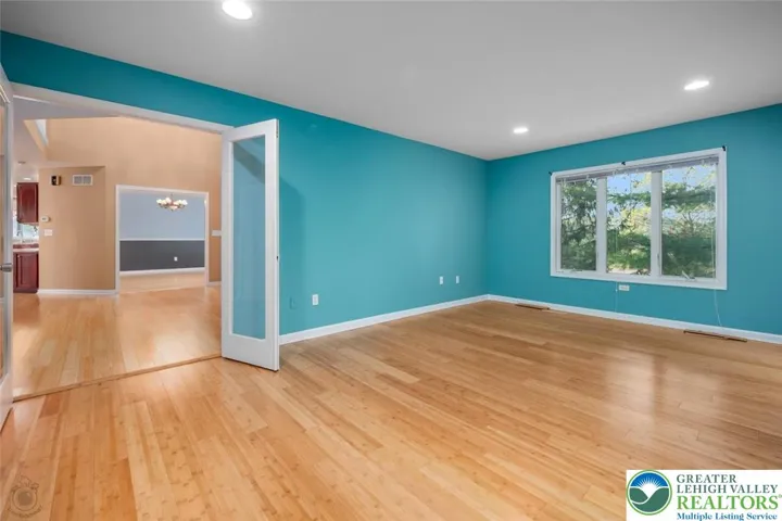Living room with lots of natural light and french doors