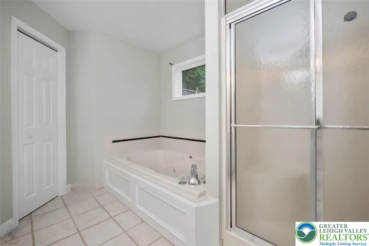 Jacuzzi tub and walk in shower