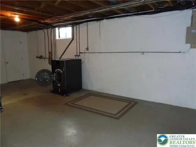 Basement With Combination Washer/Dryer