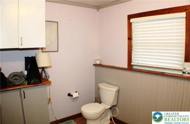 Laundry and 1/2 bath (powder room) are incorporated as one