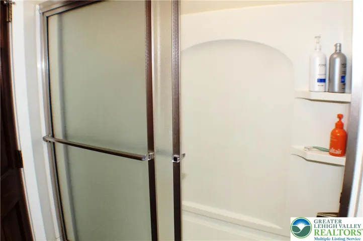 New surround, fixtures, glass doors...