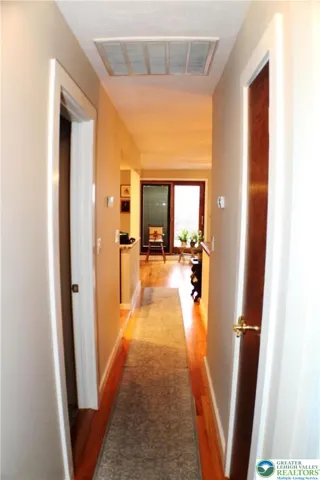 Bedrooms are at the end of the long hall