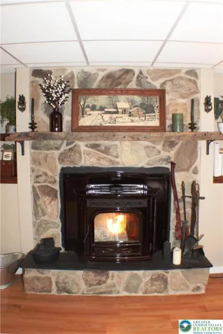 Harmon Pellet Stove insert into wood fireplace