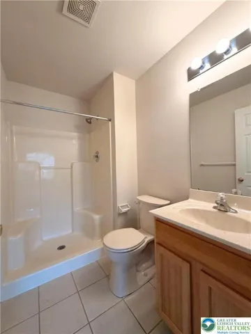 Second-floor full bathroom serving the secondary bedrooms