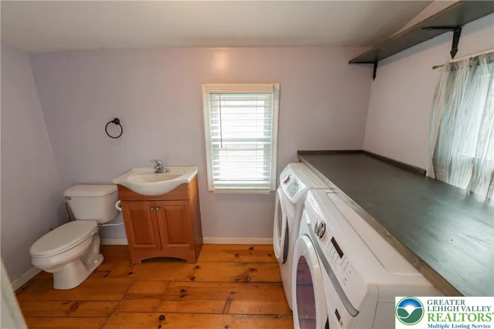 First-floor half bath and laundry