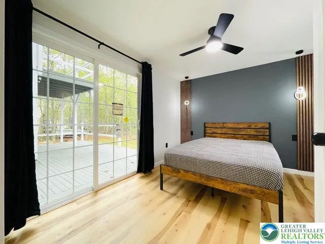 Bedroom on the first floor with direct access to the backyard