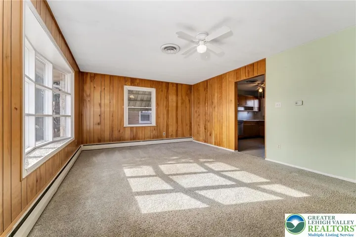 Living Room. Hardwood under carpet