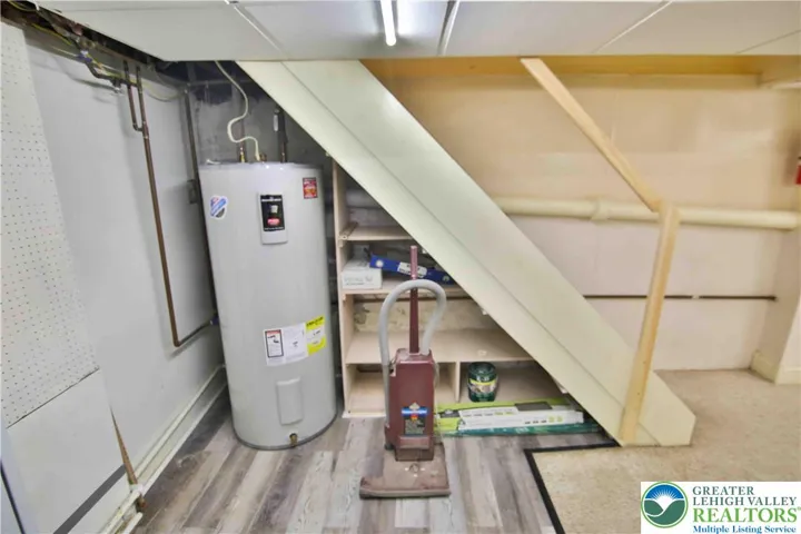 Water heater neatly tucked away to allow more usable space.