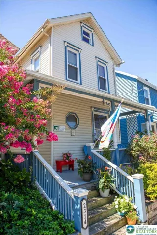Classic Victorian charm w/mature landscaping (photos 8/25) (photo edited to remove power lines)