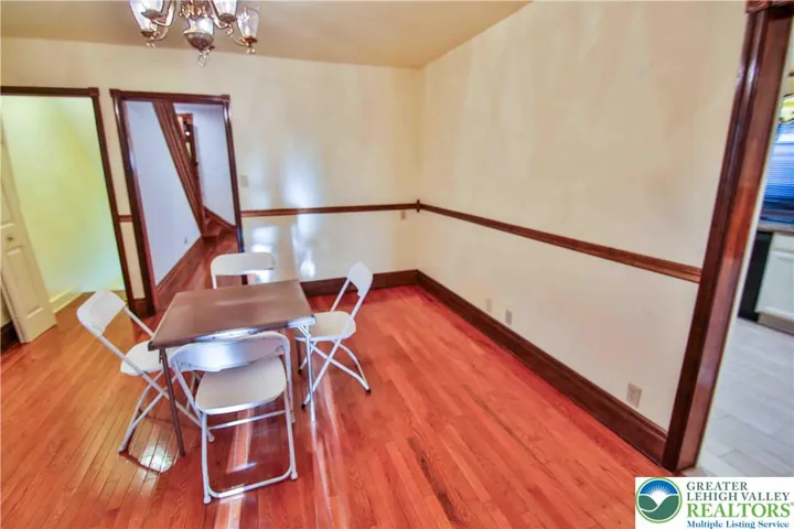 Large dining room w/chair rail & hardwood floors