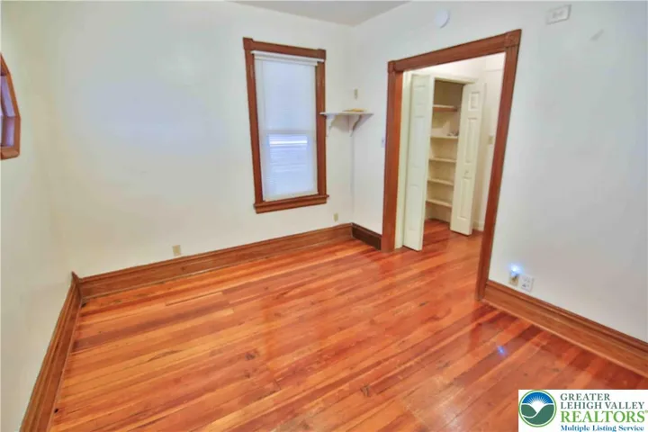 1st floor bedroom and view of closet