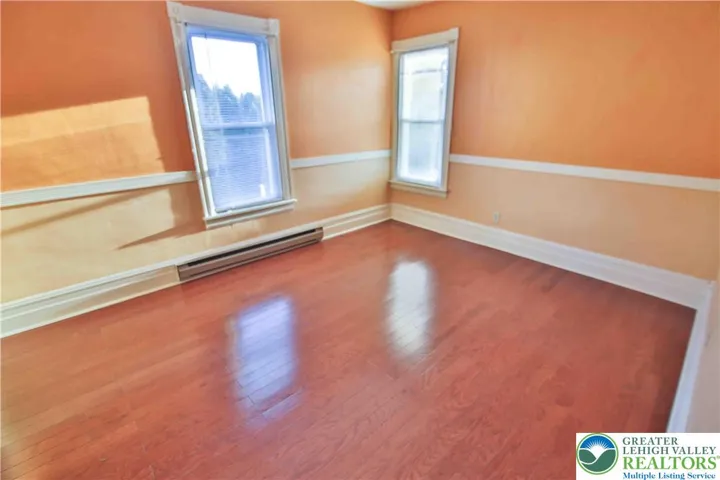 One of the 3 bedrooms on the 2nd floor - all hardwood flooring