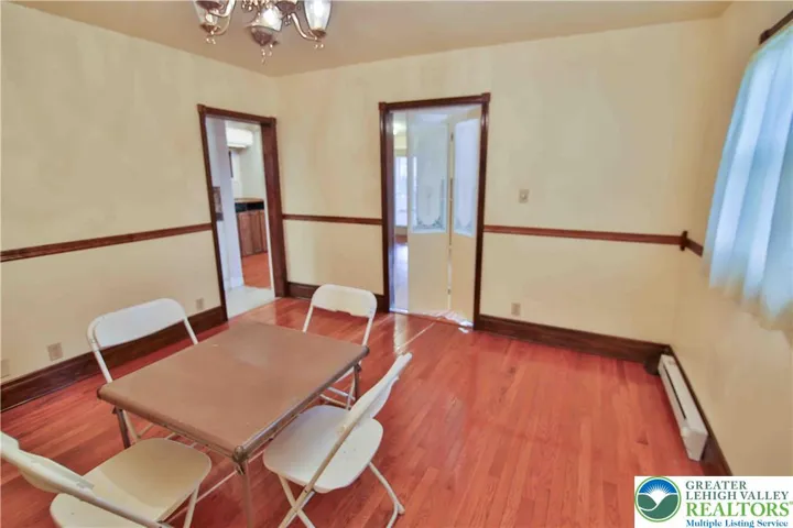 View of dining room to Family room & kitchen