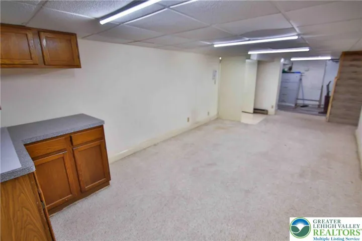 Let's check out the finished basement w/built-in cabinetry