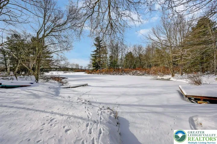 Lakefront on .92 Acres - Winter Wonder!