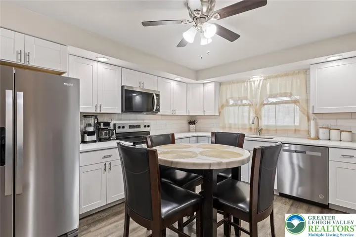Modern cabinetry with tile backsplash