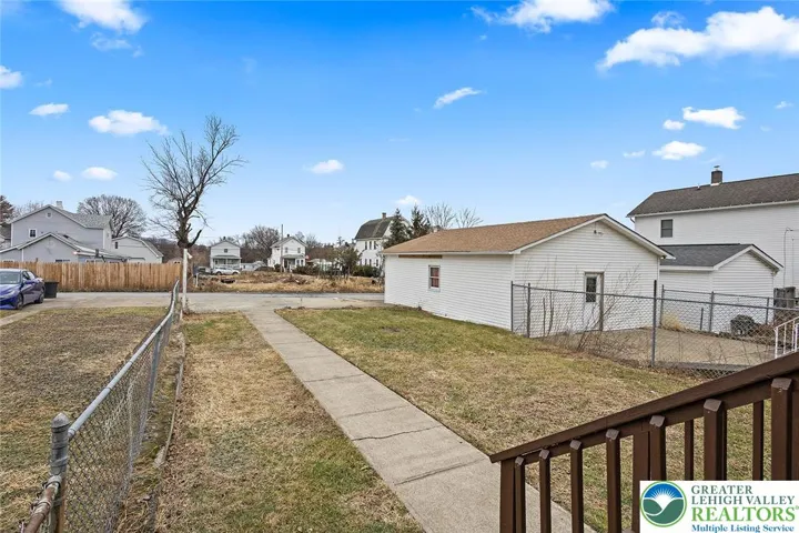 Partially fenced backyard