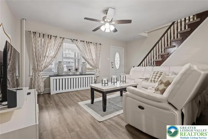Living room featuring custom radiator covers