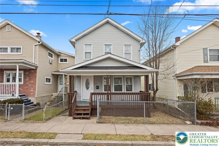 Front exterior with covered front porch