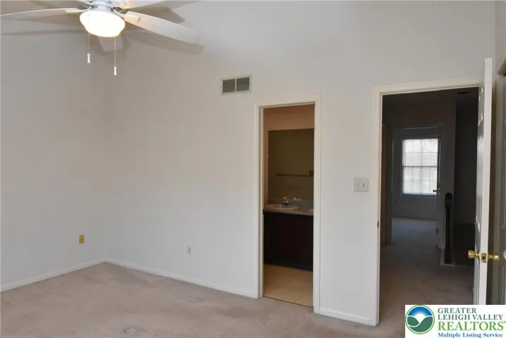 Primary Bedroom with vaulted Ceiling