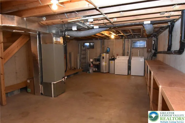 Full basement with lots of shelves