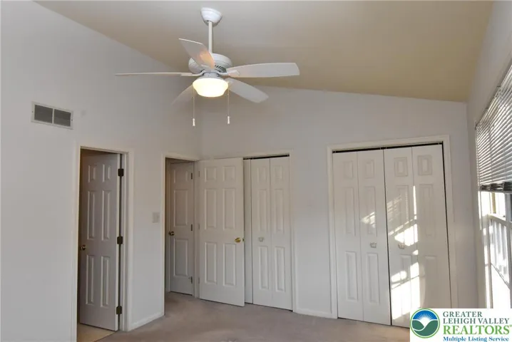 Primary Bedroom with vaulted Ceiling