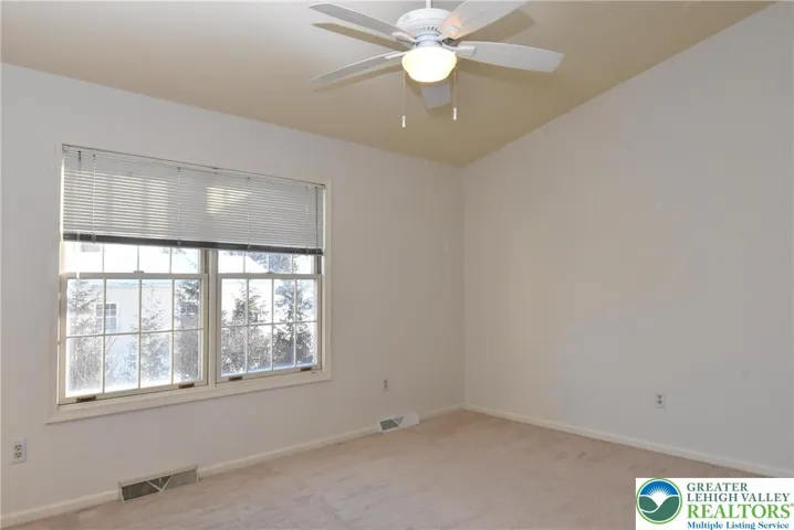Primary Bedroom with vaulted Ceiling