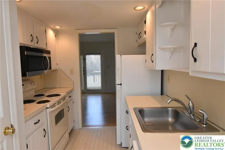 Galley Kitchen with Microwave & Dishwasher