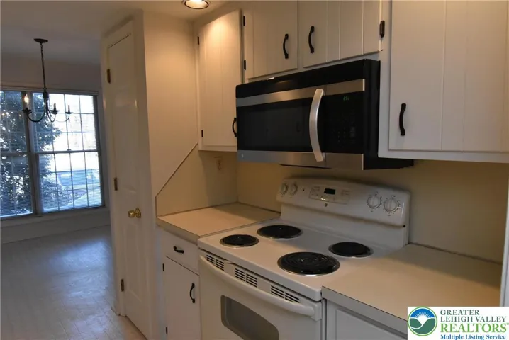 Galley Kitchen with Range & Microwave
