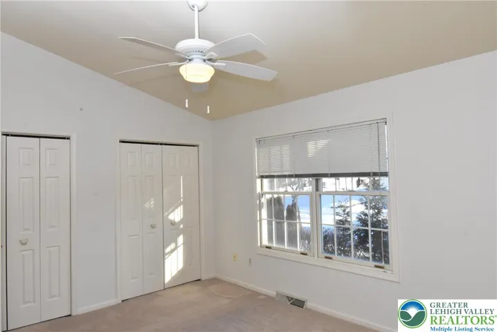 Primary Bedroom with vaulted Ceiling