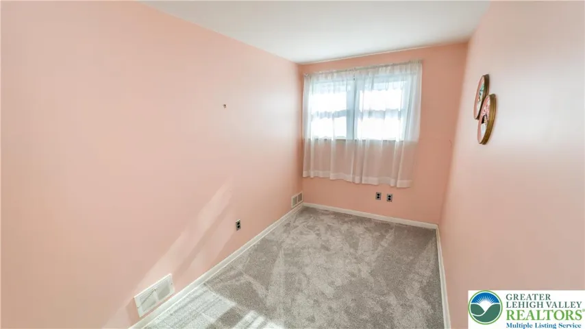Bedroom 3 - hardwood under carpet