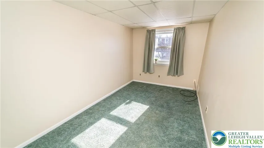 Bedroom 2 - hardwood under carpet