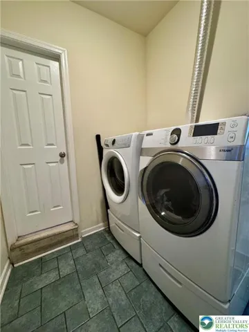 Laundry off the kitchen area.