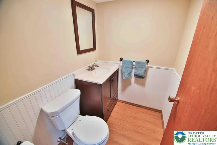 Half bathroom convenient for lower level entertaining