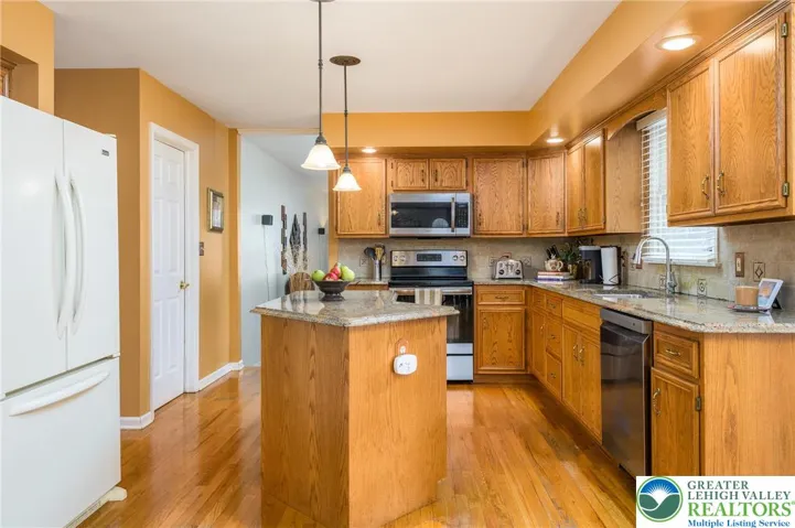 White door on left is the laundry/mudroom.  The doorway opens to the second family room on this floor.