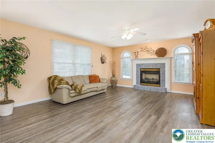 Wonderful light, a gas fireplace for cozy evenings, and lots of space for large sectionals, multiple seating...