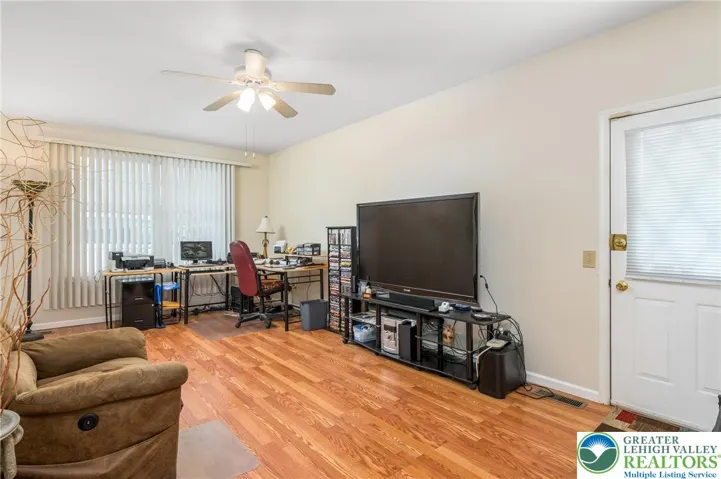 Mandoor to the back yard or around to the driveway.