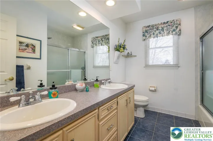 Hall Bath:  Tub/shower combo.  Linen closet.