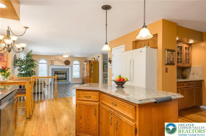Beautiful kitchen:  hardwood floor, lovely granite counters.