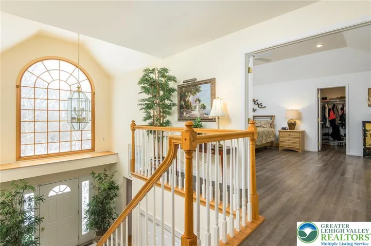 Let's go upstairs:  Did you notice the outlet on the Palladian window wall?  Lighted holiday decor couldn't be easier!