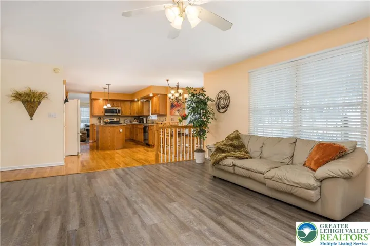 Family room with newer vinyl plank flooring.