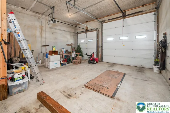2&3 of 3 garages - One large enough for box truck.